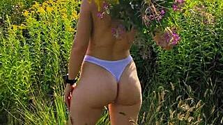 girl with small tits walks in nature wearing short shorts and t-shirt, anna mole