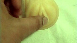 Anime girl fingers and assfucks artificial pussy in solo masturbation