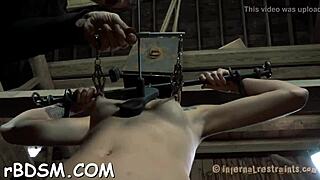 Shocking prod play on bound chick's chest and bare skin.