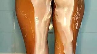 Beautiful brunette housewife swallows big dildo after flashing her ass