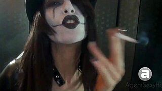 Hot agent in sexy outfit, dangling big tits and smoking