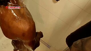 Young black straight guy showers at his gay friend's place