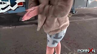 i, the petite blonde, can't hold it and piss publicly with my shaved pussy.