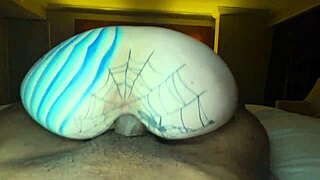 Olivia Gardens slowly rides the big black cock, her bare feet dangling in the air.