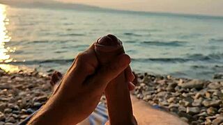 Stranger applies sunscreen on nudist beach!