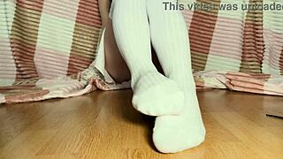 Beautiful Legs with Red Nails on Display