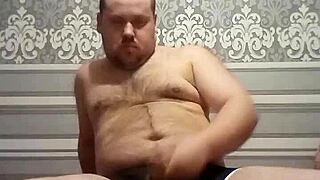 Look, this fat gay man strokes his thick cock with skill