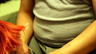 Redhead Batgirl doll tied up in blowbang, receiving footjob and bukkake cumshot from POV