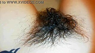 Hairy bush underwater in wild fetish close-up video.