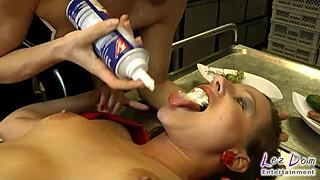 latex outfit in the kitchen punishment scene