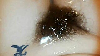 Hairy bush underwater in wild fetish close-up video.