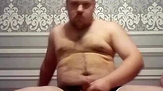 Look, this fat gay man strokes his thick cock with skill