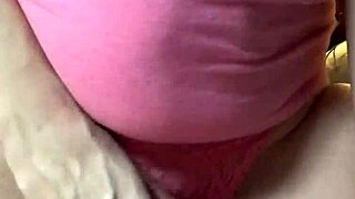 Clit rubbing escalates to wet golden shower for a trembling climax