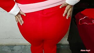 mature pregnant woman teases solo in christmas vibe.