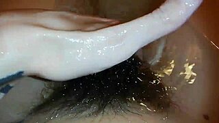 Hairy bush underwater in wild fetish close-up video.