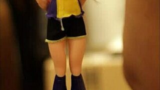 Redhead Batgirl doll tied up in blowbang, receiving footjob and bukkake cumshot from POV