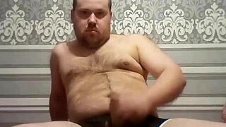 Look, this fat gay man strokes his thick cock with skill