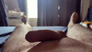 Masturbating with Sun Rays in Bedroom