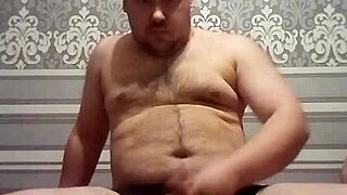 Look, this fat gay man strokes his thick cock with skill