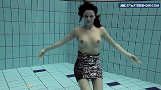 I'm flashing my bright tits underwater, getting everyone so horny.