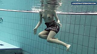 I'm flashing my bright tits underwater, getting everyone so horny.