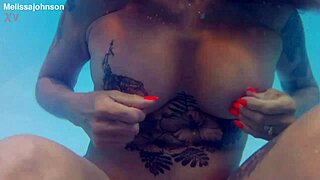 melissa the mermaid in the pool