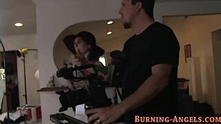 How does this tattooed goth babe pose with her small tits behind the scenes?