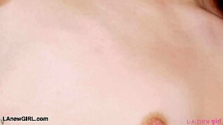 A fiery muse poses seductively on the sofa