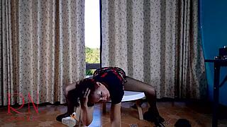 Nice lady in heels feels seductive during striptease