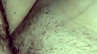 Stretching his wife's ass gently with fingers