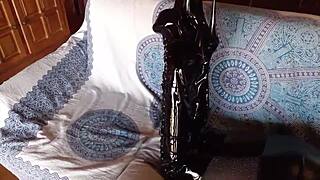 total black outfit with fishnets pantyhose and over the knee boots