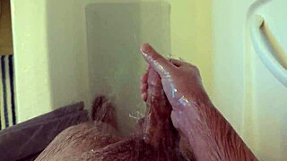 She masturbates in the shower alone