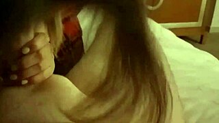 Bella Grey gives steamy hotel room blowjob action.