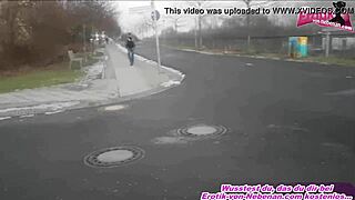 german brunette pisses into handbag outdoors