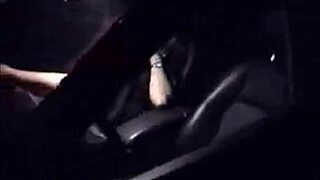 Busty milf masturbates in car.