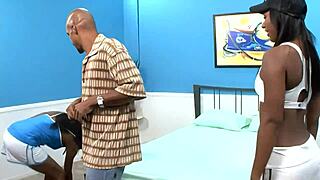 two black milfs share a wild threesome in bed.