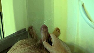 She masturbates in the shower alone