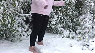 elderly couple in leggings exploring snowy outdoors together
