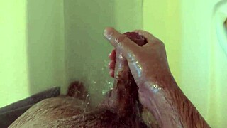 She masturbates in the shower alone