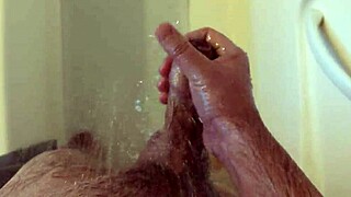 She masturbates in the shower alone