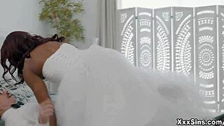 Robby dives under the bride's dress, concealing himself completely for some fun.