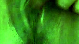 Amateur black pornstar engages in fingering and masturbation leading to squirting.