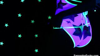 Samantha Saint enjoys lesbian sex under black light with big tits