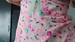 Model in sexy pink pajamas with innocent colleague