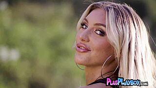 kayley gunner poses outdoors in lingerie