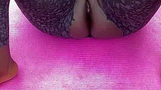 Ebony milf spreads shaved pussy during morning workout