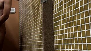 Brazilian spy in the gym shower sees a huge dick.
