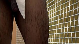 Brazilian spy in the gym shower sees a huge dick.