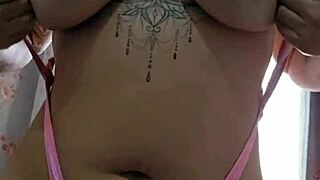 she flashes her pussy while masturbating solo