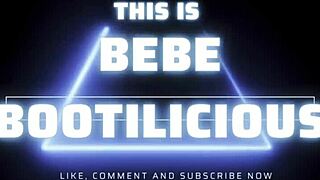 The tattooed african petite woman lies in missionary position with a big black man